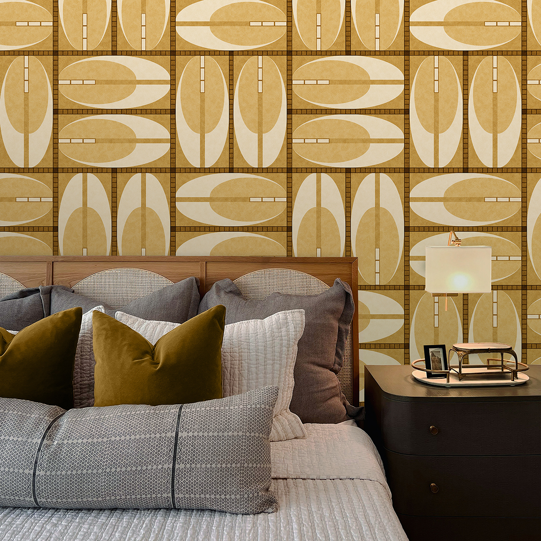 The artwork features a repeating geometric pattern of symmetrical shapes resembling elongated, curved diamonds or petals in various shades of blue and green. Each shape is split vertically with one half filled with a light blue and the other half filled with green or darker blue. The background is a light, almost pastel blue, which provides a soft yet vibrant backdrop. One of the blue shapes near the upper left contains a white starburst element, adding a focal point of brightness to the composition. The overall design conveys a modern, mid-century aesthetic with clean lines and harmonious color contrasts.